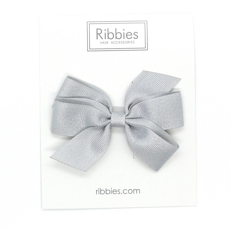Discover our Medium non slip Bow sparkly bow for girls in Silver. Perfect hair accessory for Christmas!