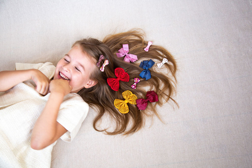 Medium Bow sparkly bow for girls in navy blue. Perfect hair accessory for Christmas!