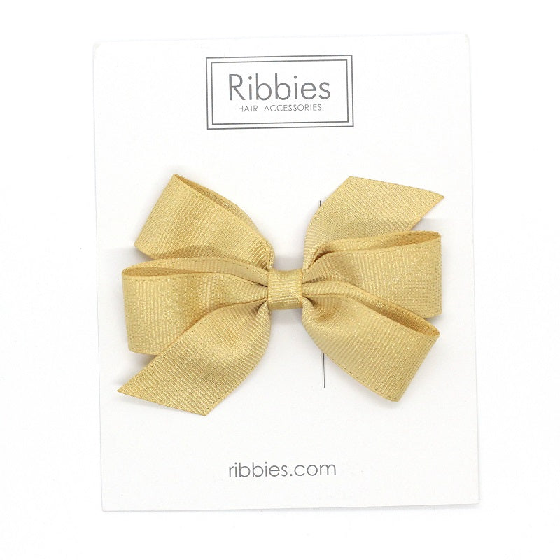 Medium Bow sparkly bow for girls in gold. Perfect hair accessory for Christmas!